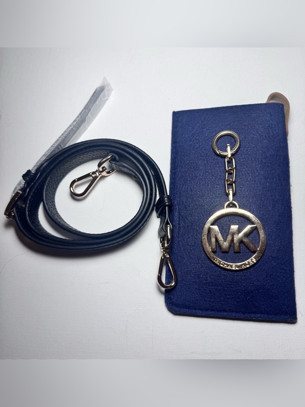 Bundle of 2 pieces Michael Kors bag’s Black pebbled Leather Strap & Gold MK Logo
